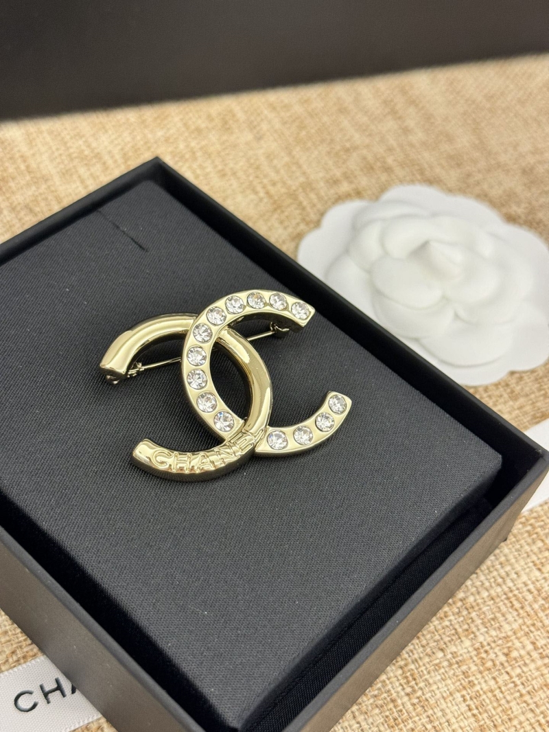 Ch*el brooches